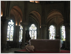 East end radiating chapels (1160-1200) with modern glass (1960), Abbey St-Nicolas, St-Leu-d'Esserant click for full-size image