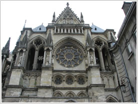 North transept, upper levels (1211-41), rose window (mid-13th c.) & gable (c. 1497), Reims Cathedral click for full-size image