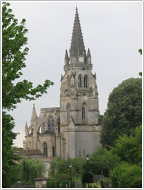 Coll&eacute;giale d'Uzeste (14th c.), belfry (15th c.), steeple (19th c.), from north