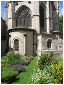 Flower beds behind east end, Cahors Cathedral