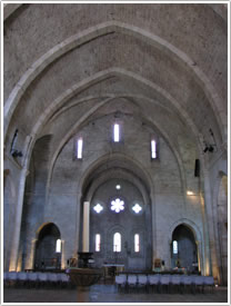 Cistercian abbey interior with tunnel vault and transverse ribs (1151-1252), looking east, Sylvanès Abbey click for full-size image