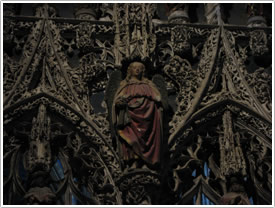 Angel on northwest end of jubé (late 15th c.), Albi Cathedral click for full-size image