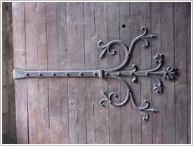 South portal door, left side with metal hinge strap, St-Pierre, Moissac click for full-size image