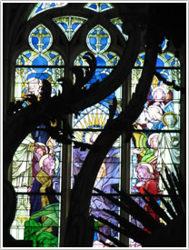 East end chancel window, left side (15th c.), Luçon Cathedral click for full-size image
