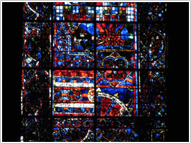 Window #57, northwest transept, St. Lawrence, lower panels (border 13th c. & modern glass 1967), Chartres Cathedral click for full-size image