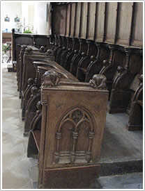 North choir stalls (1400, oldest in Normandy), Abbey, Cerisy-la-Forêt click for full-size image