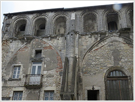 Ruins of old priory north nave aisle (1115-35) & 19th c. houses below, Notre-Dame, La Charité-sur-Loire click for full-size image