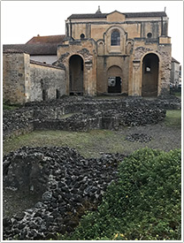 Looking west over ruins to 1st nave bay (11th c.), Abbey, Charlieu click for full-size image